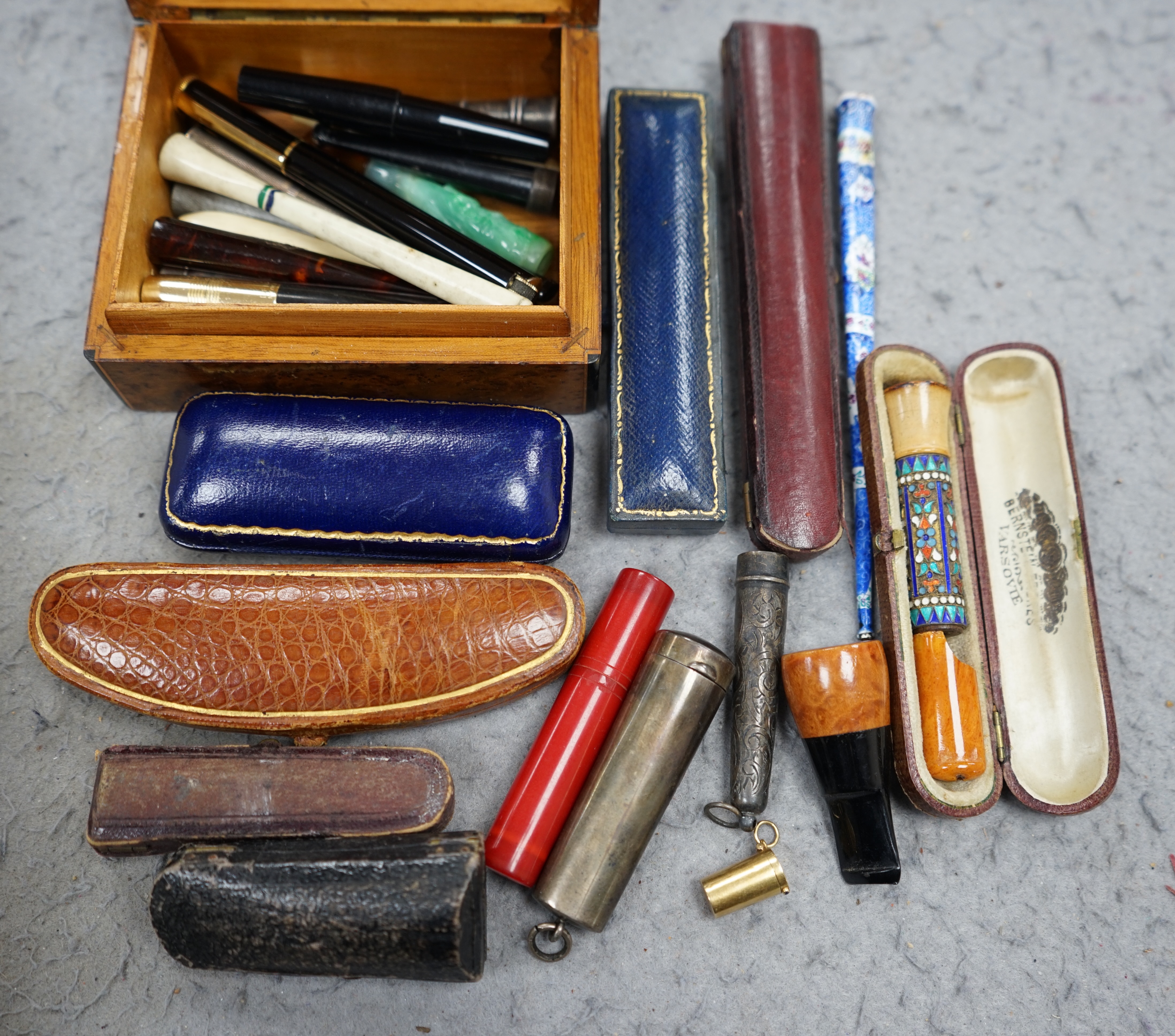 A group of assorted cigar and cheroot cigarette holders, some cased. Condition - fair